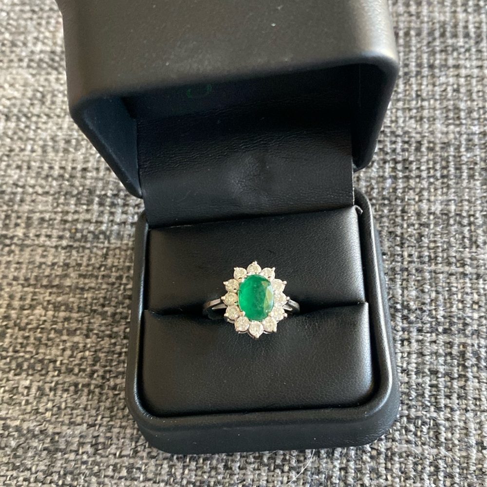 Custom designed “Princess Diana” ring with emerald and diamond
